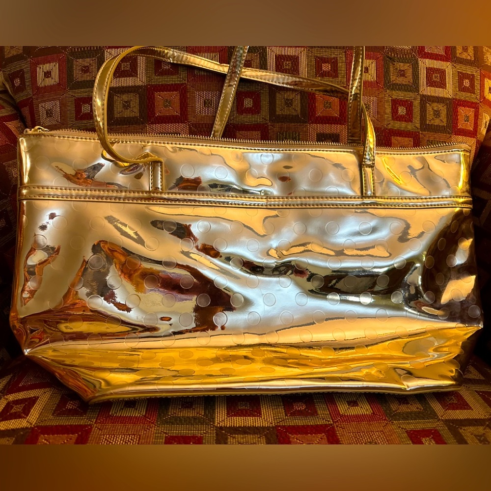 Kate Spade lg. gold metallic gold tote bag. Like new. 19" by 11"
